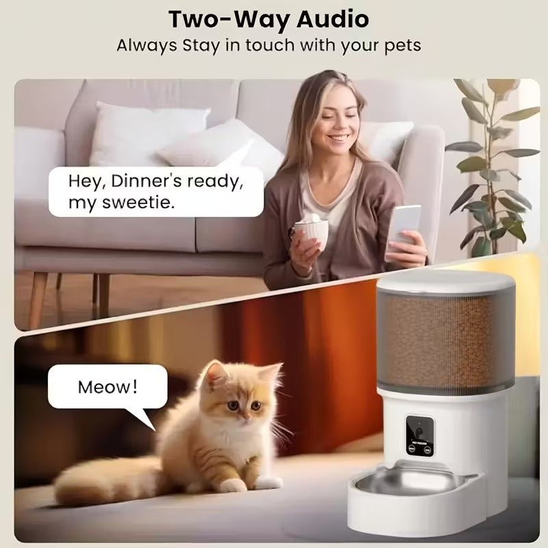 Woman using a smartphone with two-way audio feature, interacting with a cat and a pet feeder.