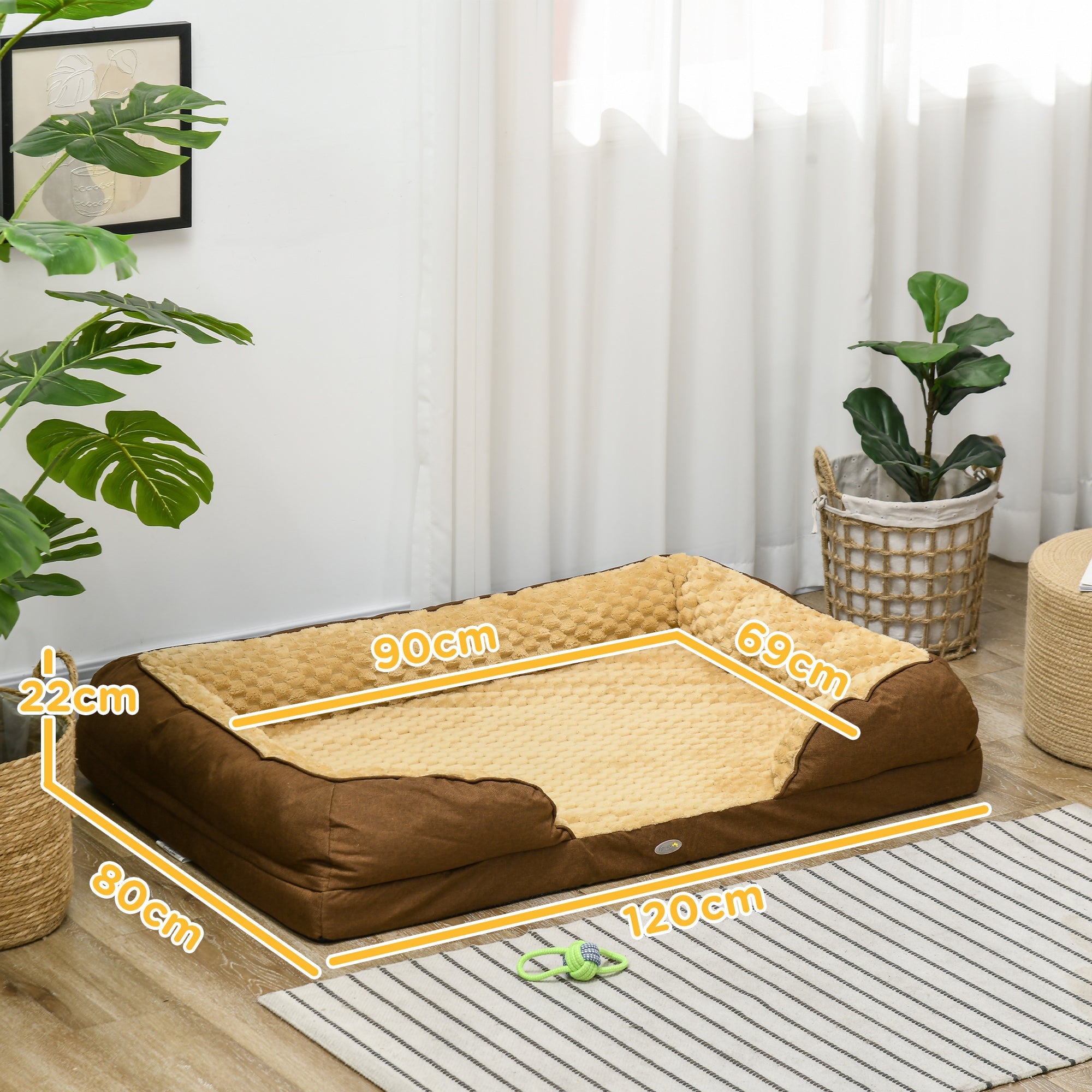 Measurement chart of a brown pet bed with dimensions in a room setting.