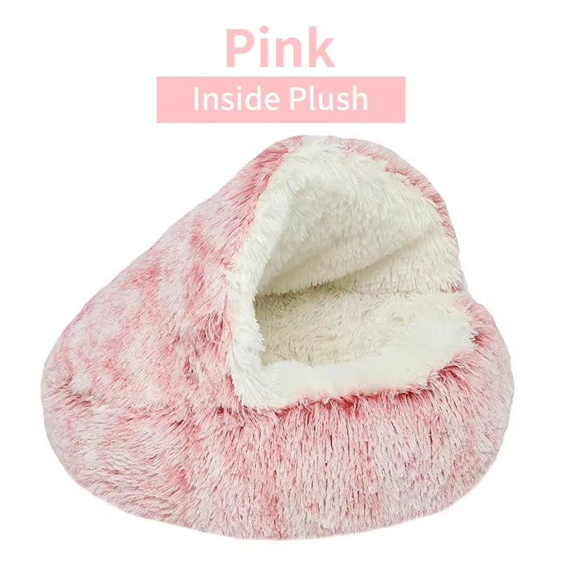 Fluffy pink pet bed with white interior on a white background