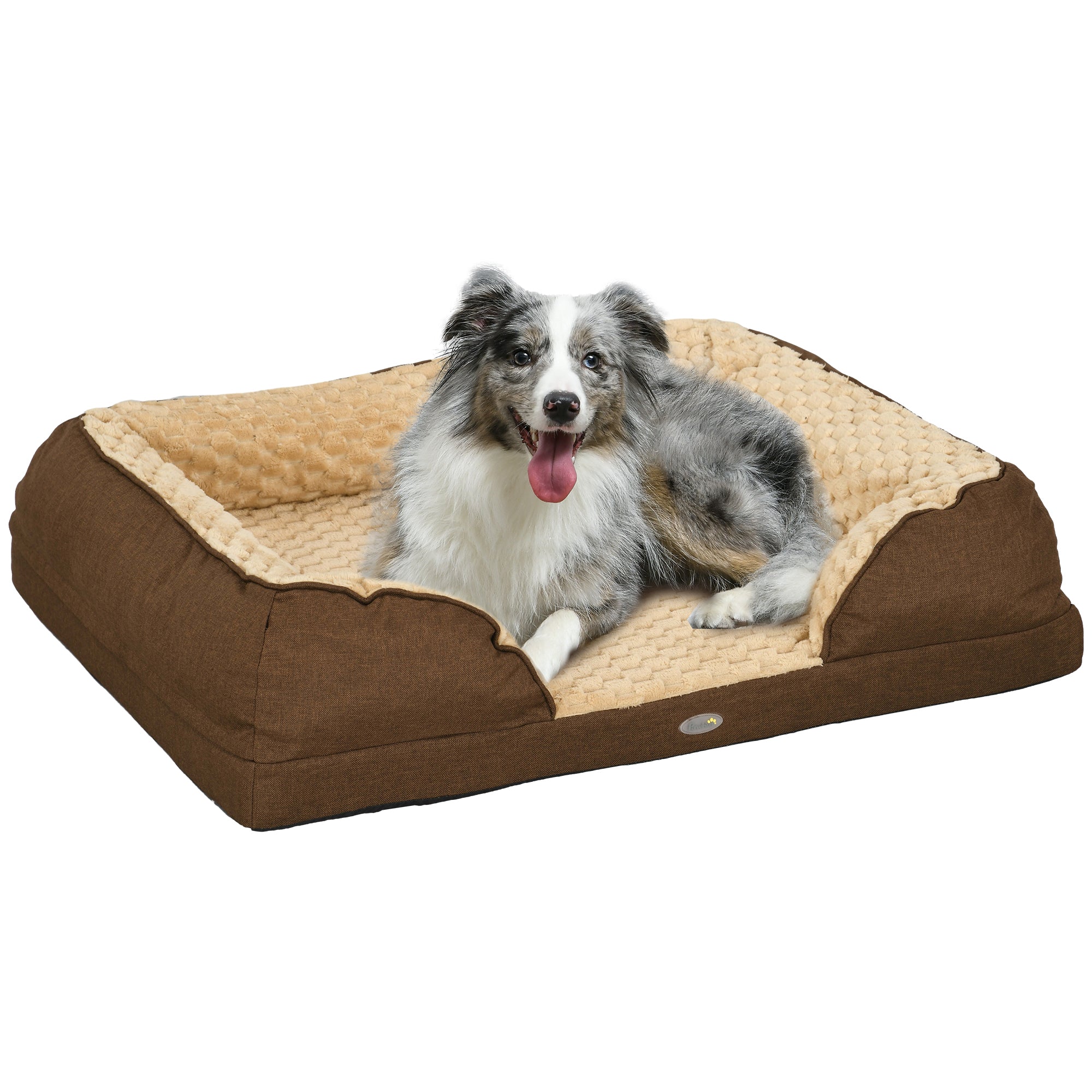 Dog lying on a brown and beige pet bed with a white background