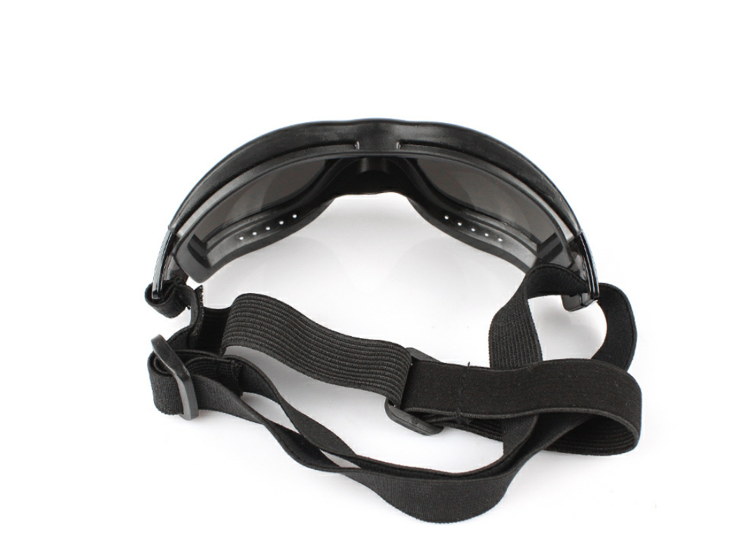 Black goggles with a strap on a white background