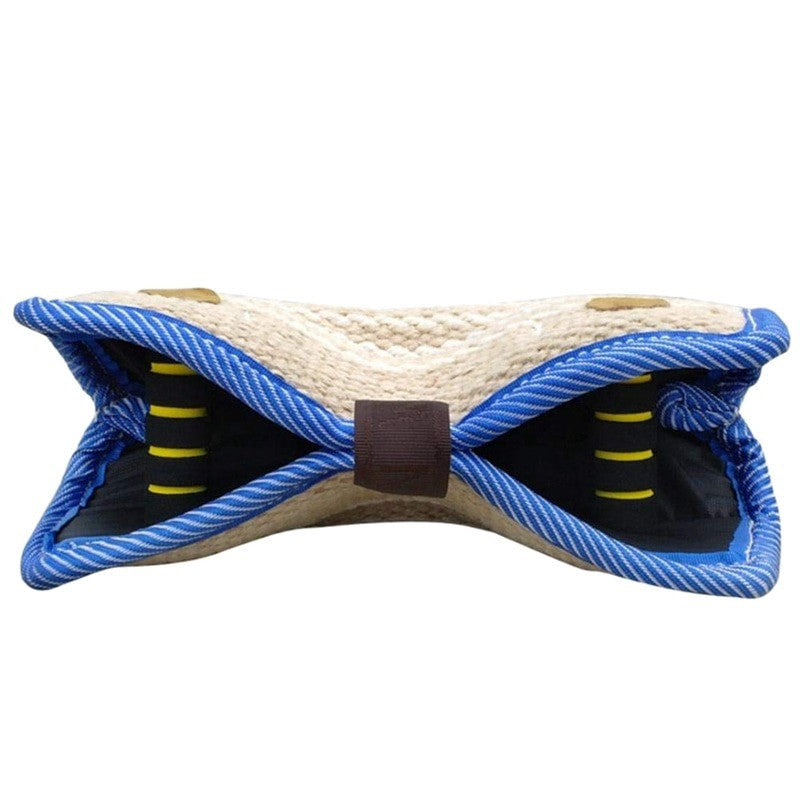 Dog toy with blue rope and straw-like top on a white background