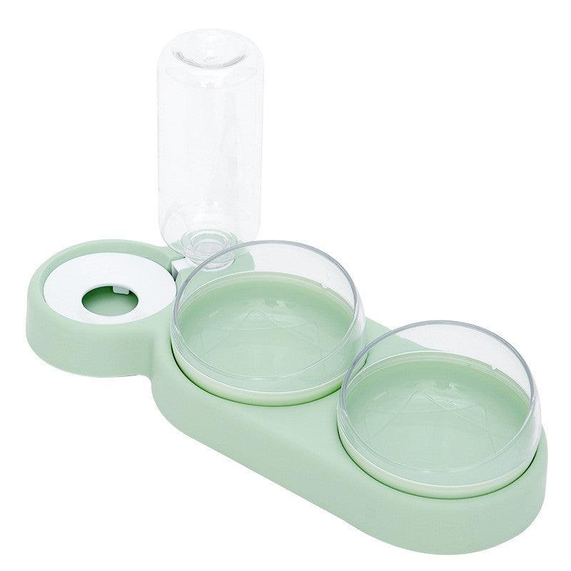 Green pet water and food bowl set on a white background