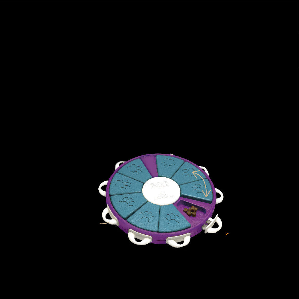 Round pet toy with purple and blue design on a black background