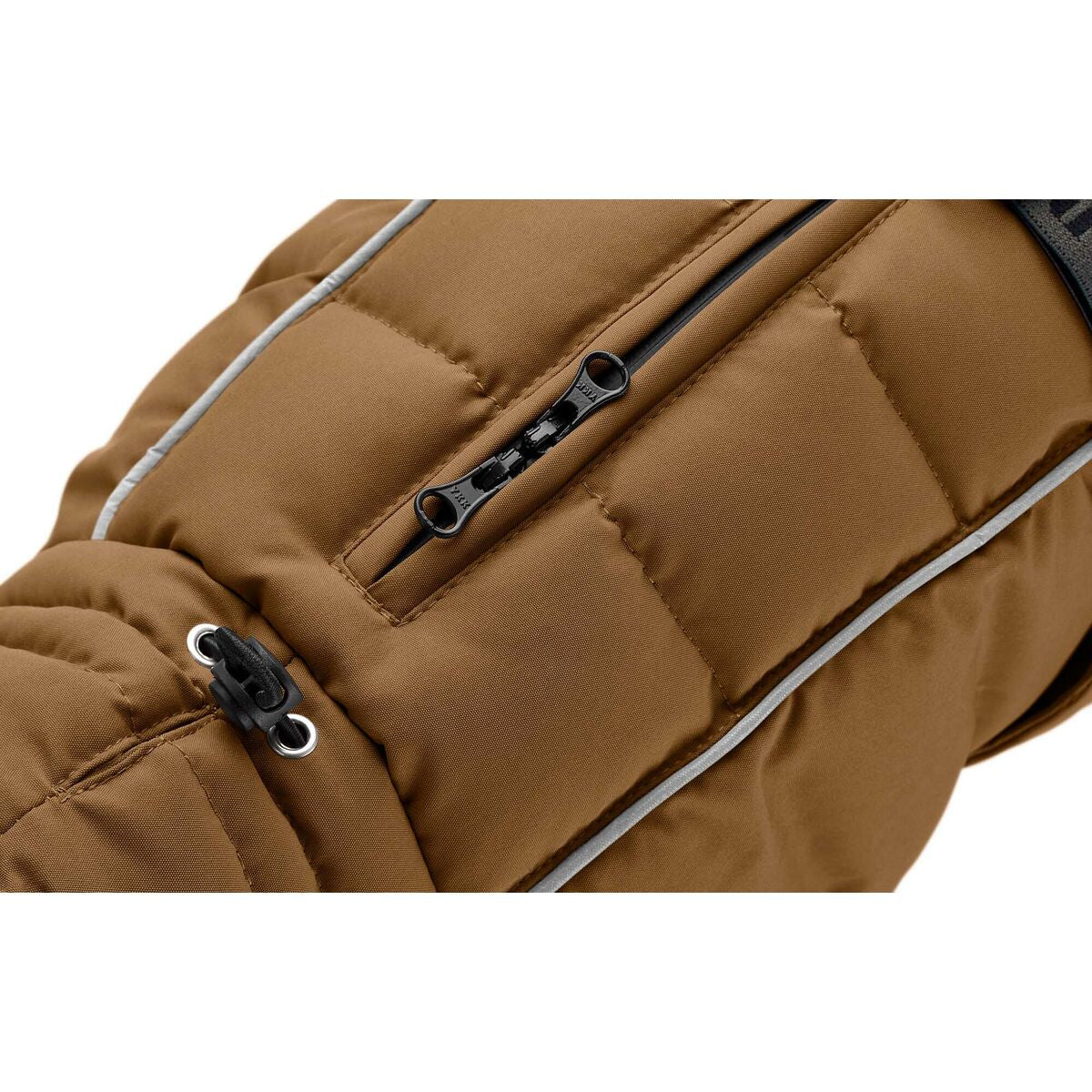 Close-up of a brown quilted bag with zippers on a white background