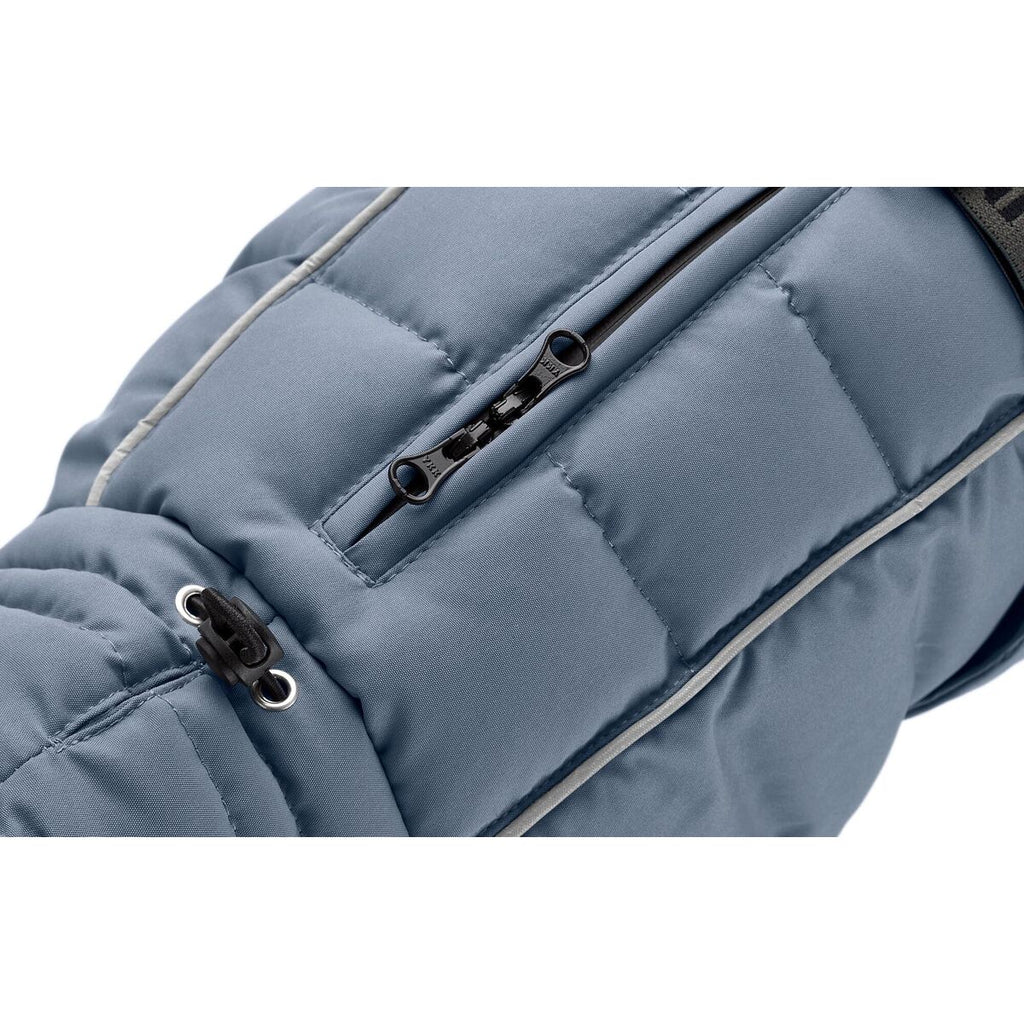 Close-up of a blue puffer jacket with a zipper on a white background