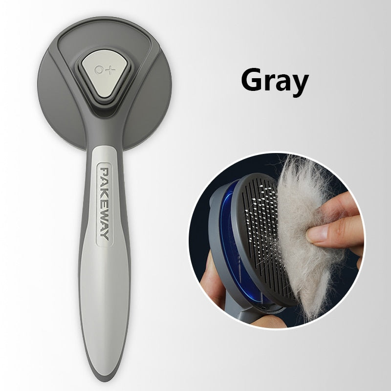 Gray PAKEWAY pet grooming brush with close-up of use on a white background