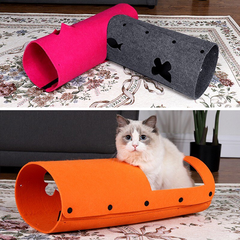 Two cat tunnels, one pink and one gray, on a patterned rug. Below, an orange tunnel with a cat inside on a different rug.