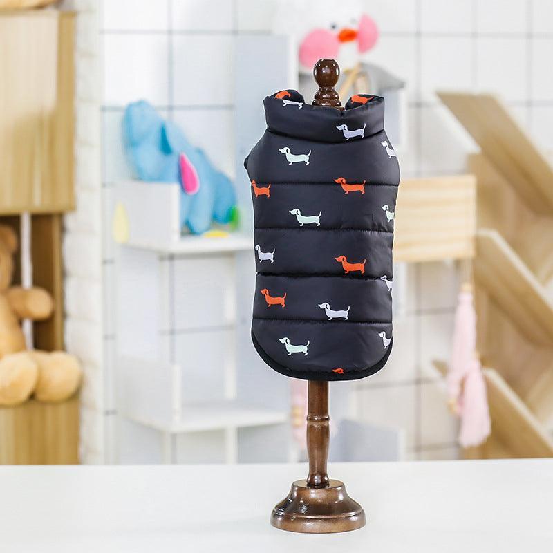 Black puffer vest with dog pattern on a mannequin stand in a store setting