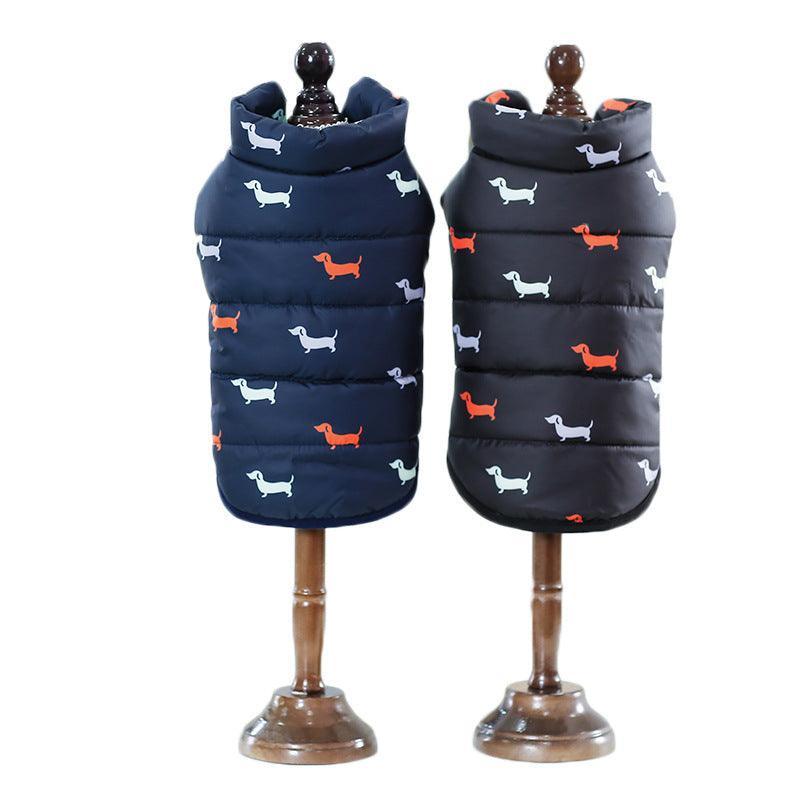 Two navy blue dog coats with small dog pattern on mannequins against a white background