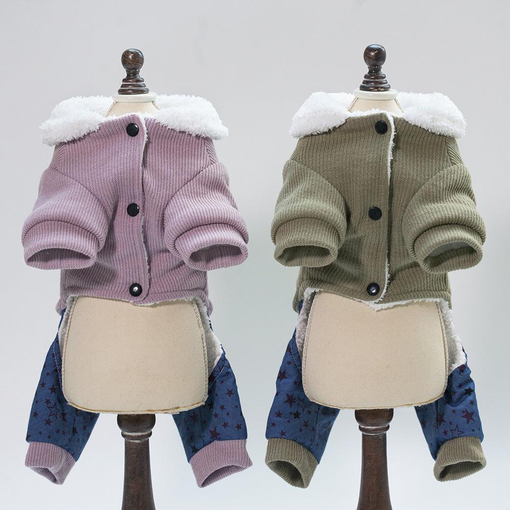 Two dog outfits on mannequins with purple and green jackets and blue pants against a gray background.