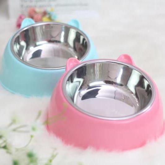 Two pet bowls, one pink and one blue, on a white background.
